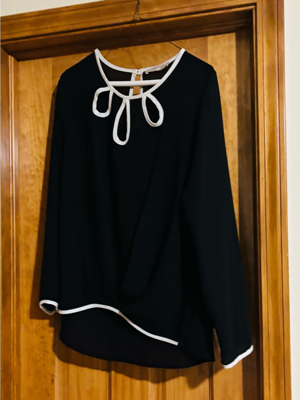 Black Long-Sleeve Blouse with White Trim and Keyhole Bow